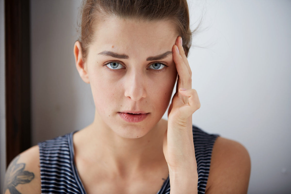 Tired-looking skin with under-eye lines more visible after makeup